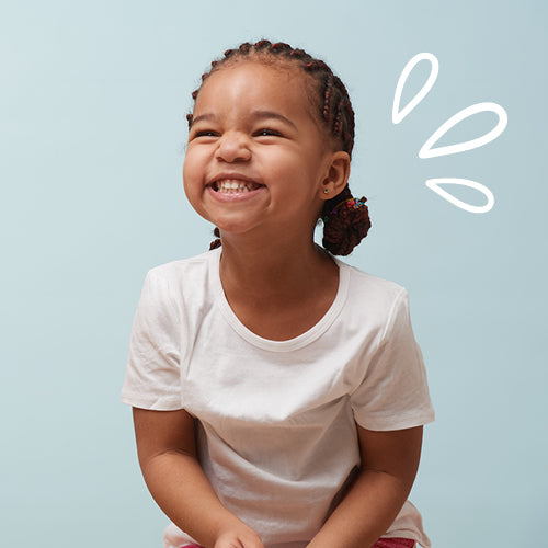 smiling little girl in braids