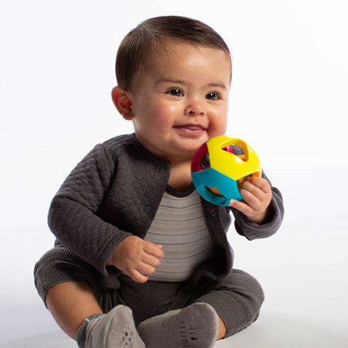 Infant boy with toy